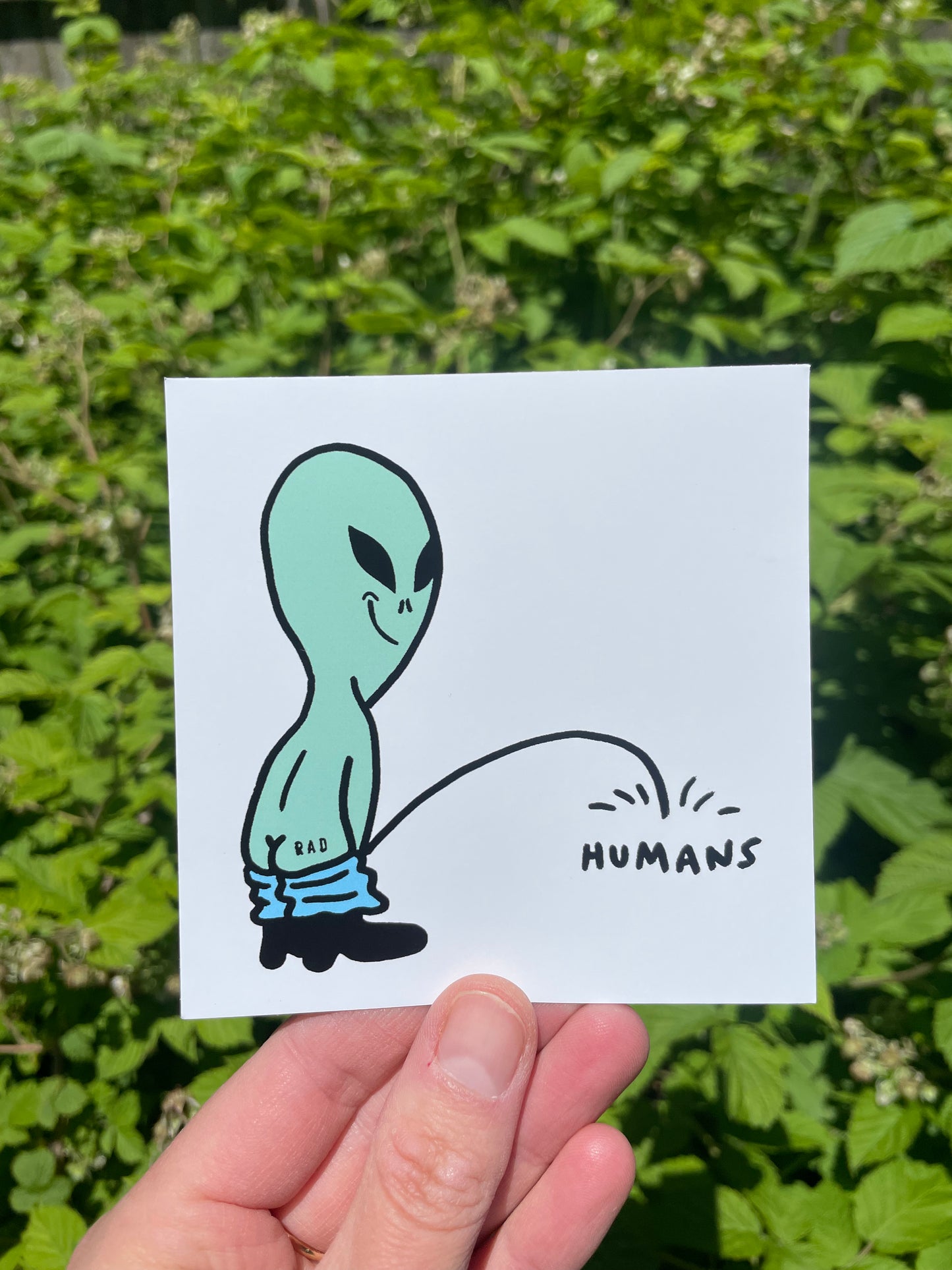 Alien Making Fun of Humans Sticker